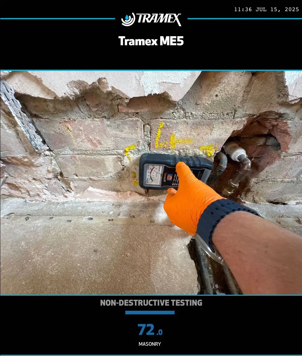 This kitchen is in the early stages of renovation, with Rajvar preparing the screed for flooring.