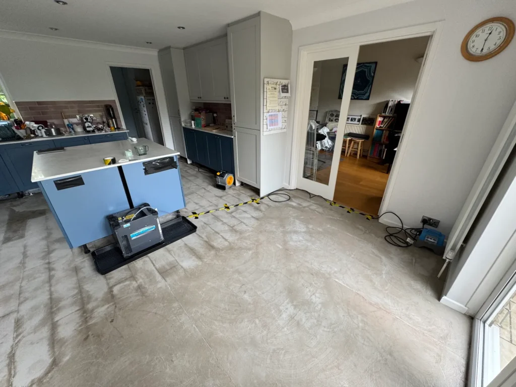 Rajvar has enclosed a staircase in plastic sheeting to contain dust during works.